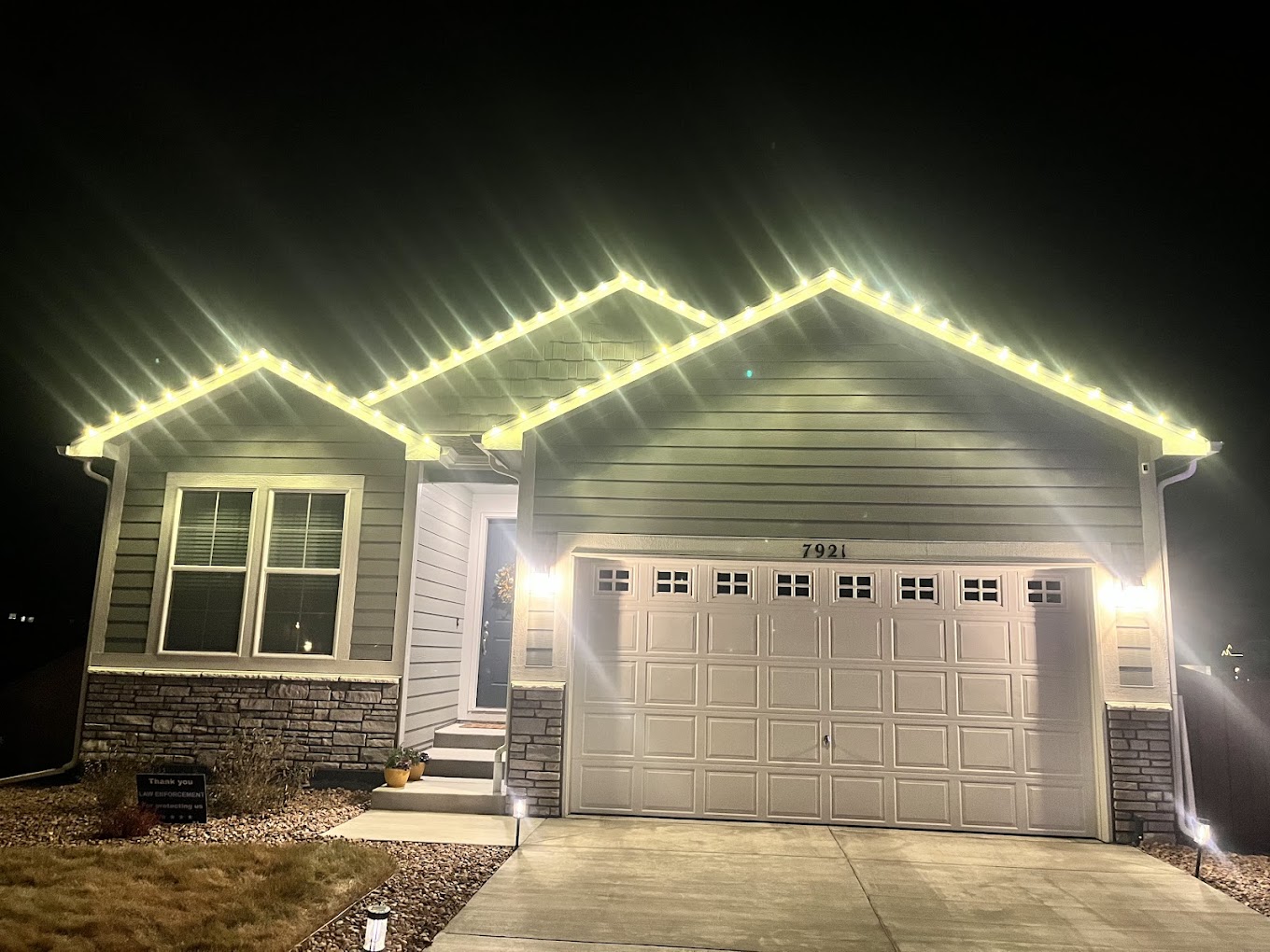 Warm white roofline Warm white roofline Christmas light installation on a residential home by our Front Range crew